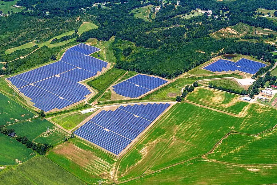 Aerial view of a ground-mounted utility-scale solar farm